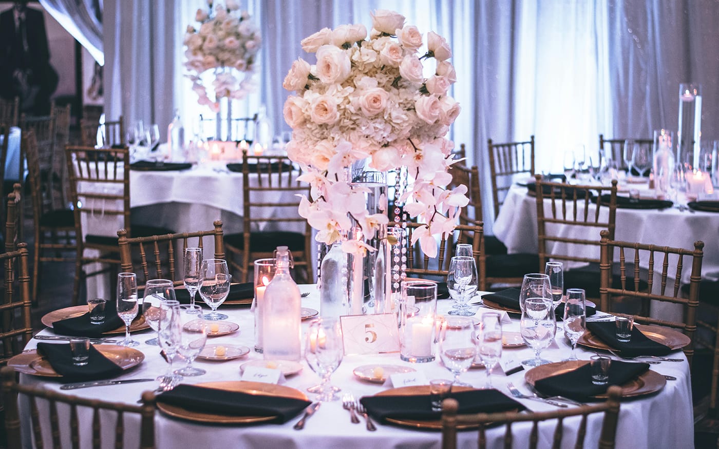 Rose pink floral wedding table arrangement